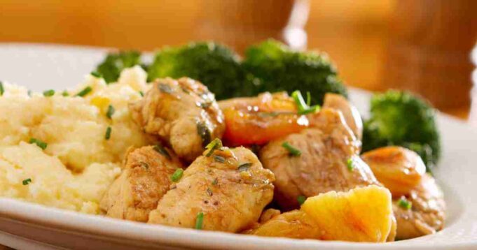 Succulent Healthy Apricot Chicken with a Glaze of Apricot Sauce and a Sprinkling of Fresh Herbs.