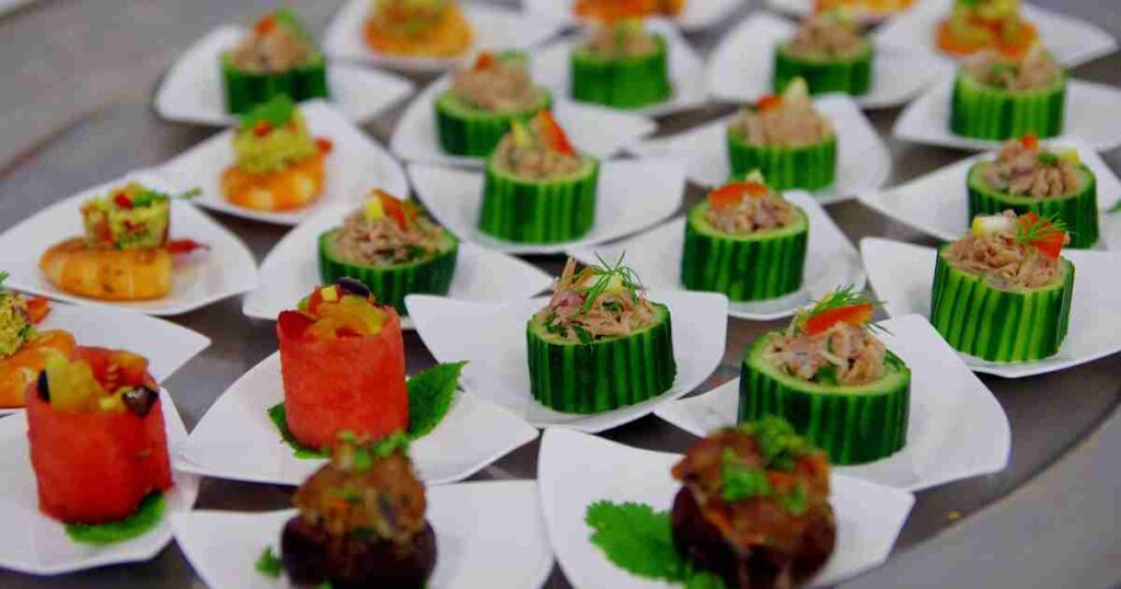 Elegant Tuna Spread Canapés on a serving platter, garnished with fresh herbs. tuna spread canapés Tuna Spread Canapés Tuna Spread Canapes 1024x538