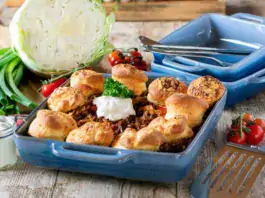 Golden-brown minced beef cobbler fresh out of the oven, with a fluffy biscuit topping and rich, savory filling.