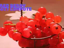 Luscious Red Berry Fruit Compote in a crystal bowl with a spoon, ready to be served.